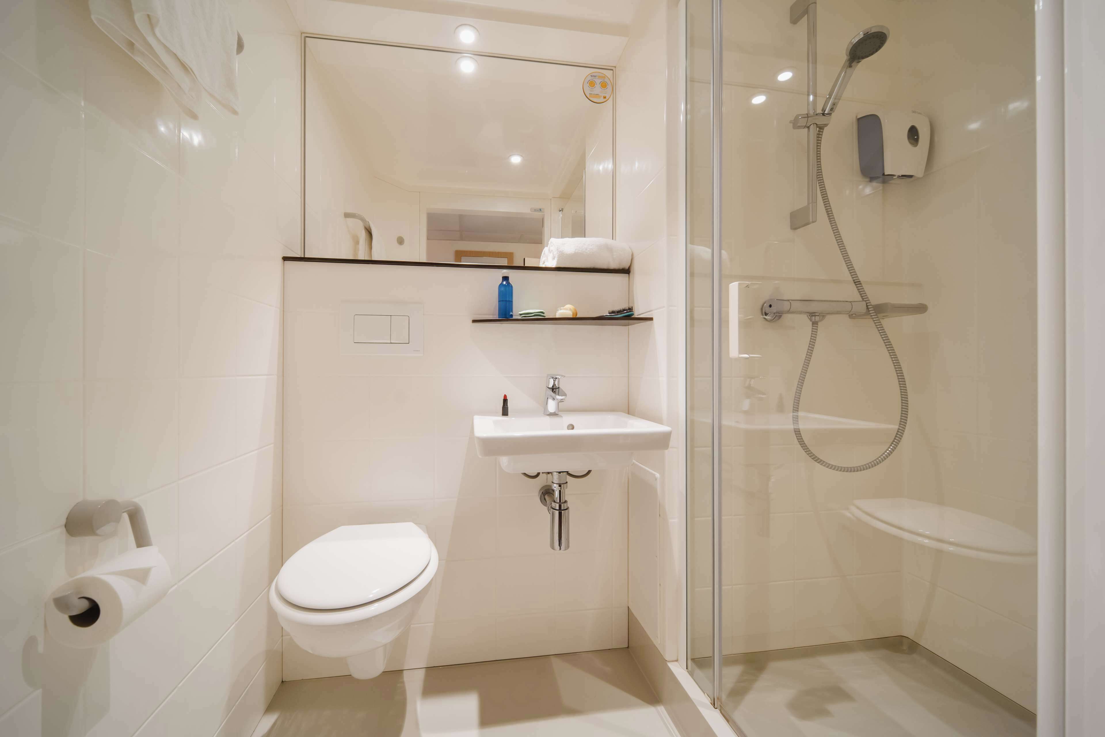 shower, eco-friendly toiletries, towels