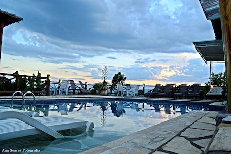 Outdoor pool, pool umbrellas, sun loungers
