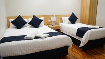Deluxe Queen Single with Ensuite Bathroom | Premium bedding, blackout drapes, free WiFi, bed sheets