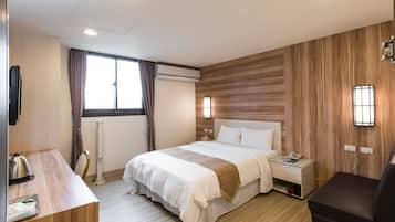 Fashion suite room | Desk, blackout drapes, soundproofing, iron/ironing board