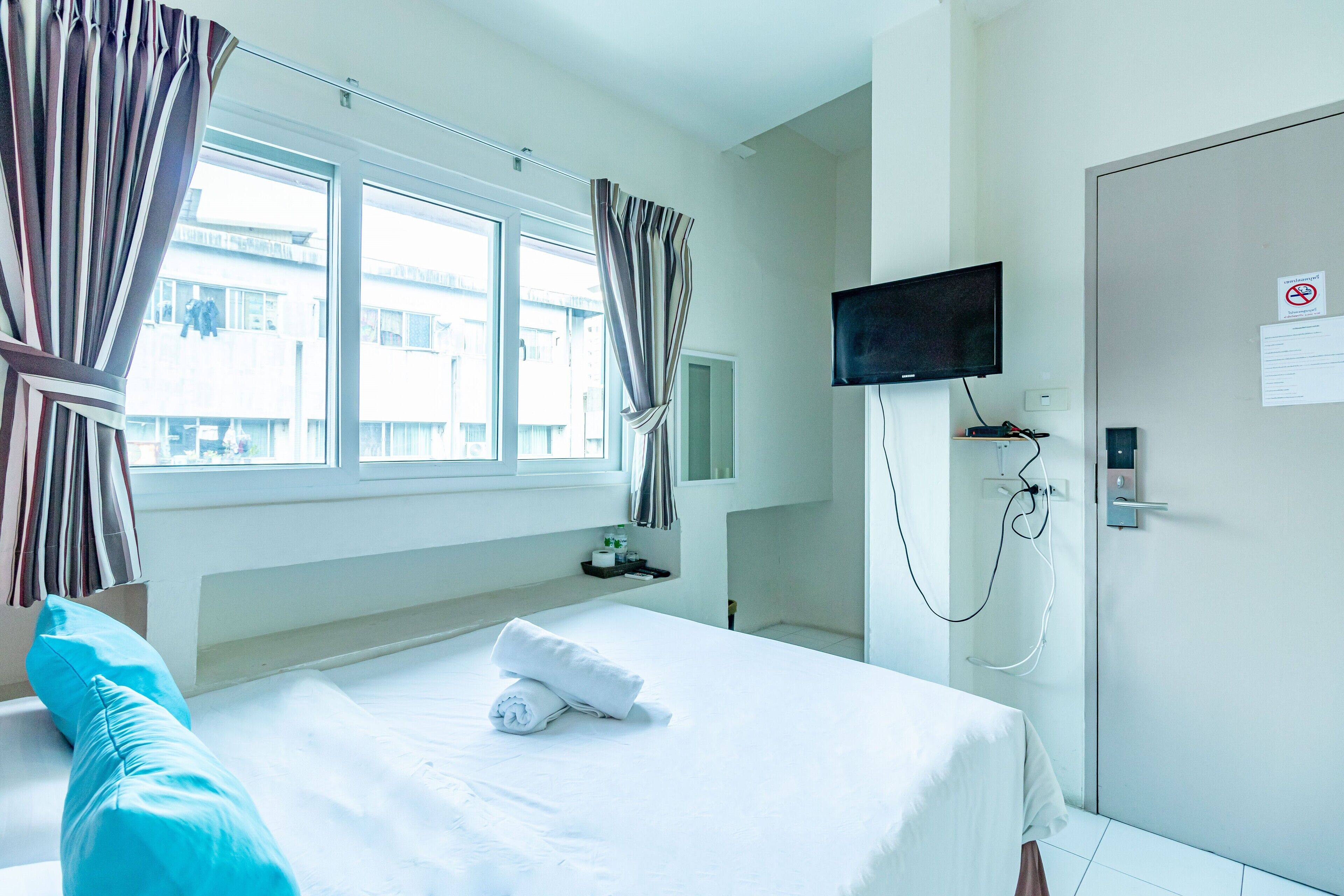 Chambre Double Deluxe, salle de bains privée | Coffres-forts dans les chambres, Wi-Fi gratuit