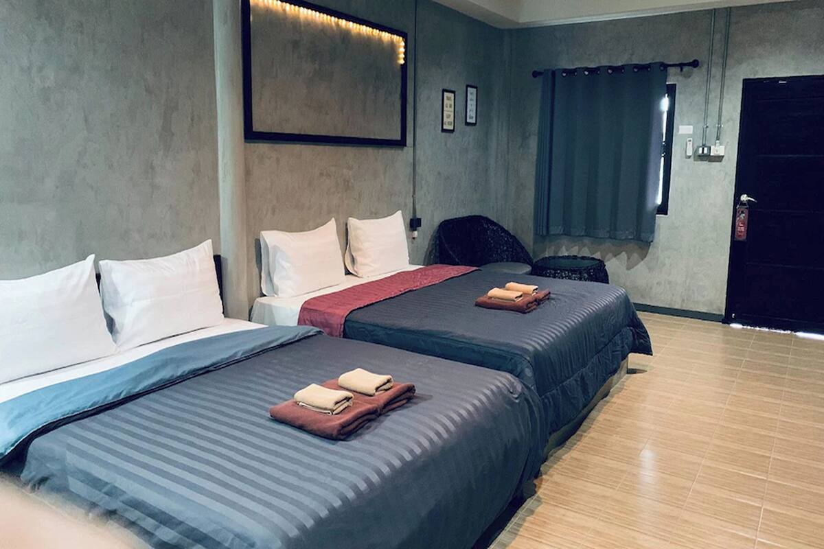 Family Room | Desk, blackout drapes, rollaway beds, free WiFi