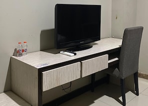 Desk, laptop workspace, blackout curtains, bed sheets