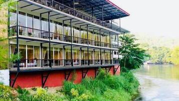 Guests can enjoy scenic views from the balconies with outdoor seating areas.