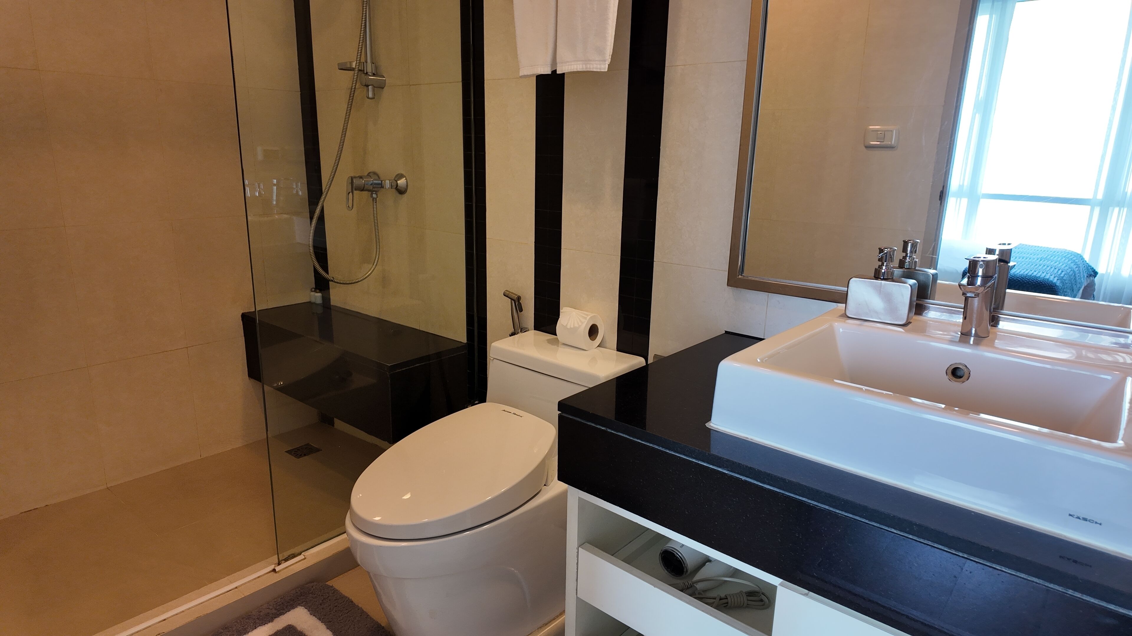 one bedroom suite | bathroom | shower, free toiletries, hair dryer, towels
