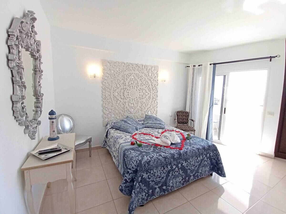 studio, sea view | in-room safe, desk, blackout curtains, iron/ironing board