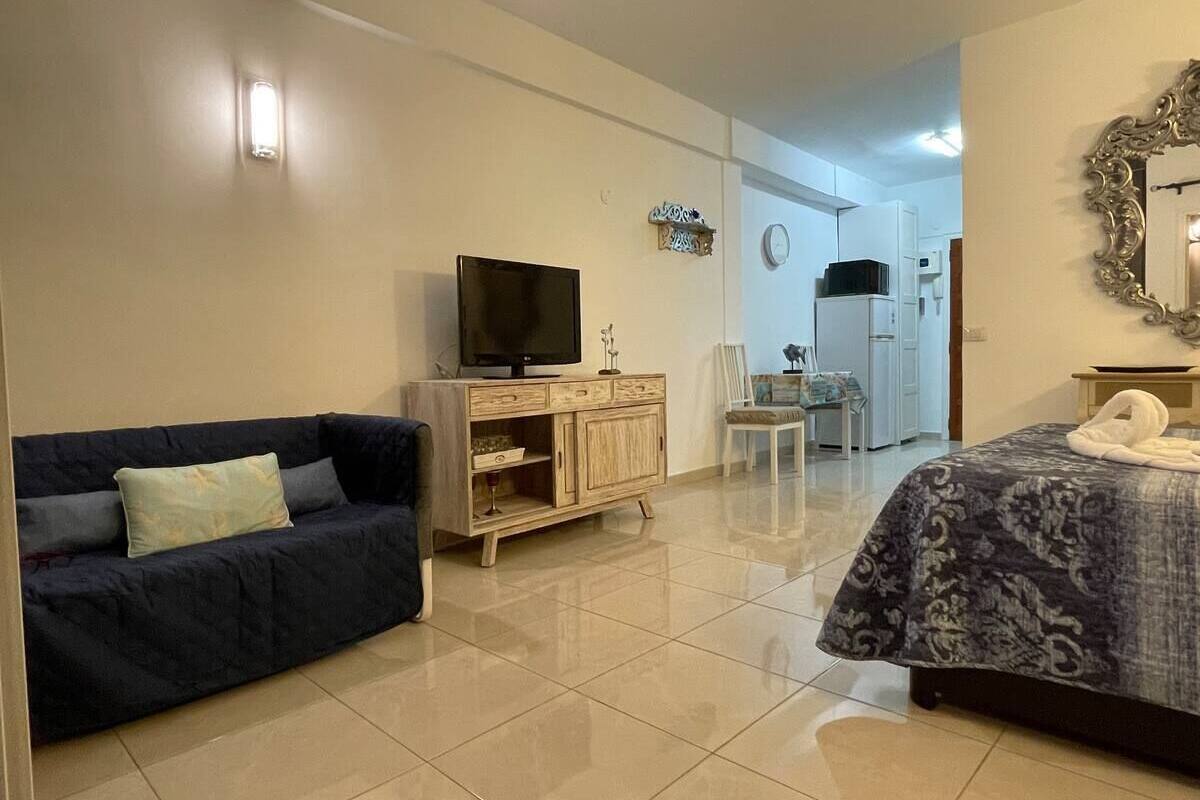 studio, sea view | in-room safe, desk, blackout curtains, iron/ironing board