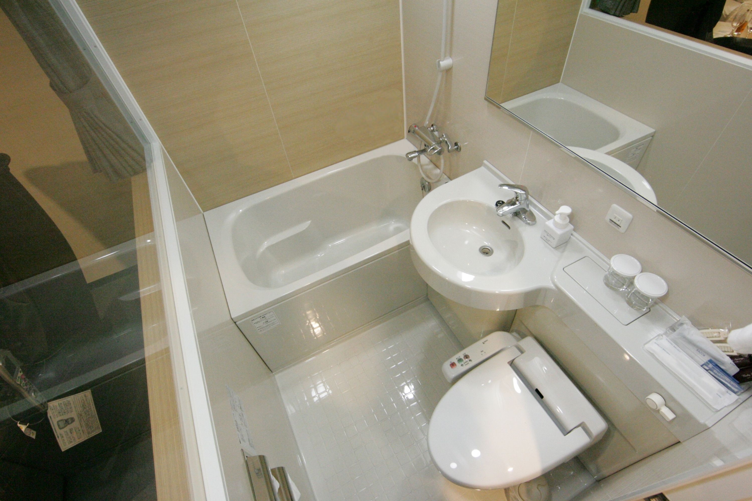 premium room, 1 queen bed, smoking | bathroom | combined shower/bathtub, deep-soaking bathtub, free toiletries