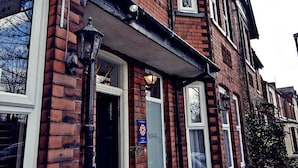 A brick building with a sign for 'St. Mary's Guest House' and a phone number. - St Mary's Guest House  (York)