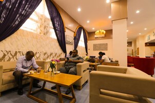 Breakfast, lunch, dinner served; local and international cuisine 