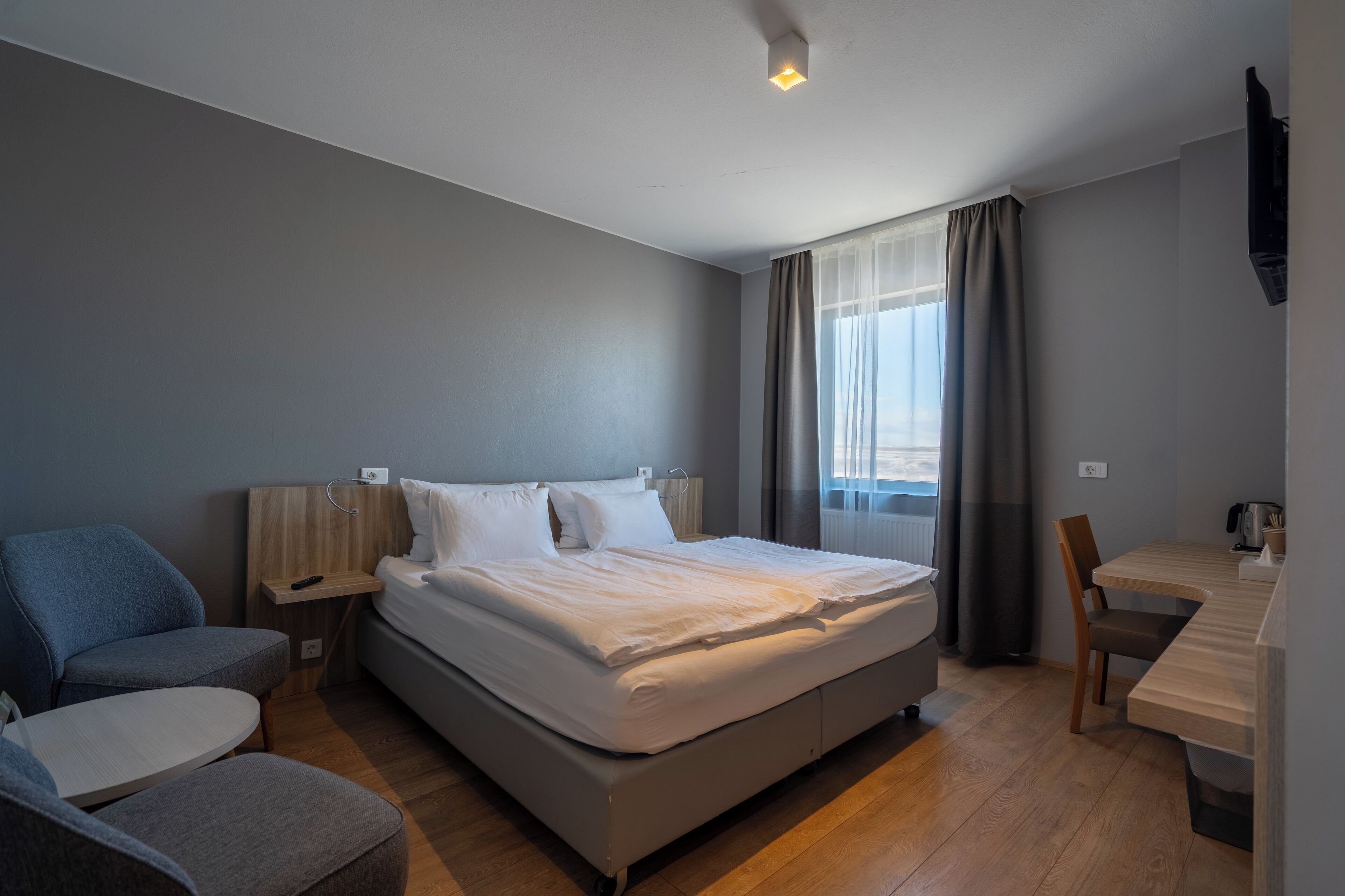 superior double room | 1 bedroom, desk, laptop workspace, blackout curtains