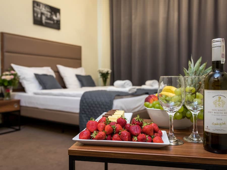 Triple Room | Minibar, in-room safe, iron/ironing board (on request), WiFi (free)