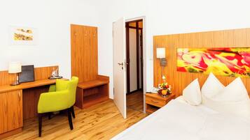 Hypo-allergenic bedding, in-room safe, desk, laptop workspace