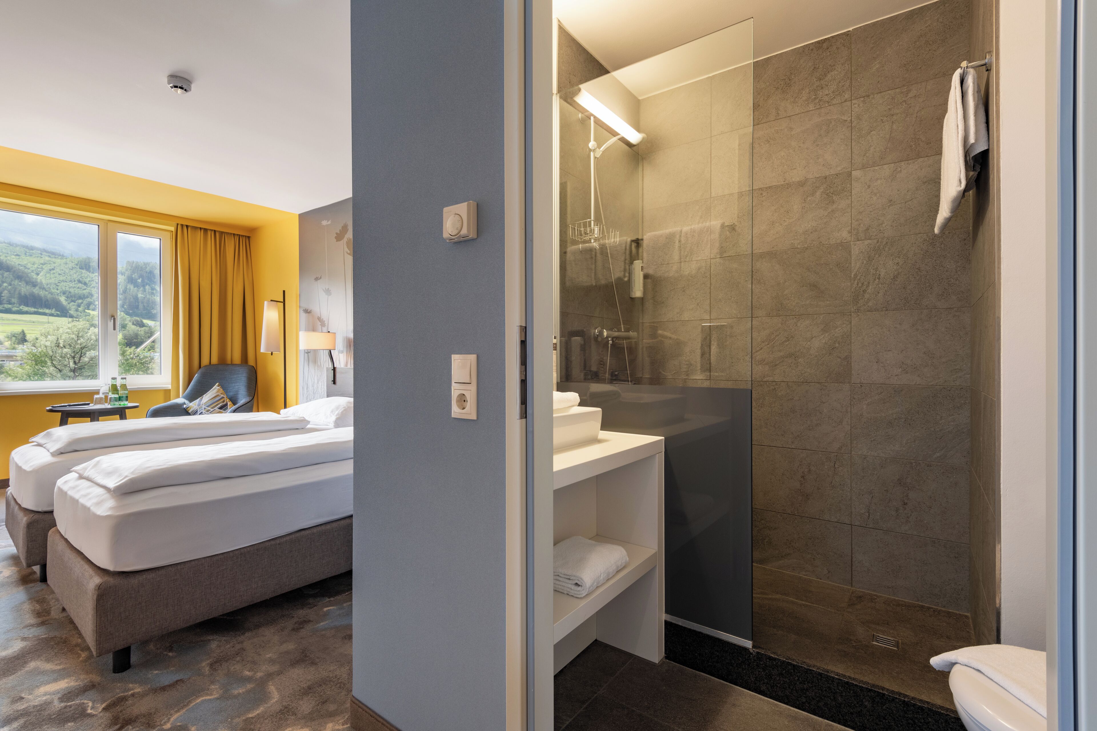 laptop workspace, blackout curtains, soundproofing, iron/ironing board