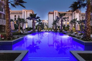 10 outdoor pools, pool umbrellas, pool loungers