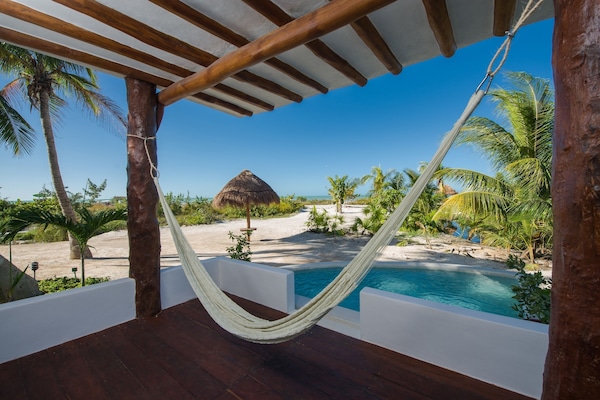 Junior Suite sea front and private pool: 2 queen beds | View from room