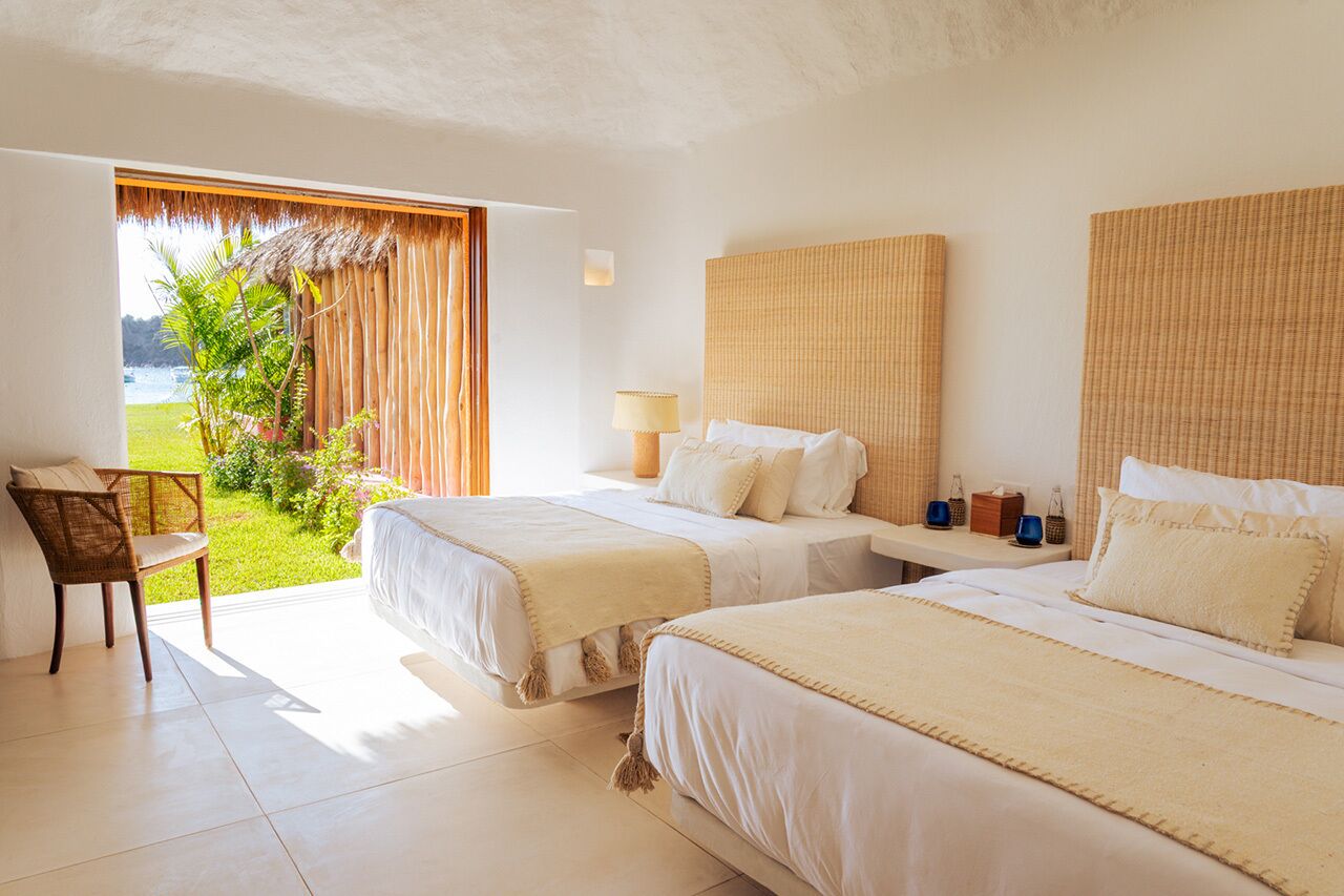 standard bungalow, 2 queen beds, ocean view (bungalow queen) | in-room safe, individually furnished, free wifi, bed sheets