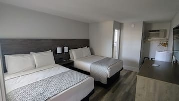 Standard Double Room, 2 Double Beds | Blackout drapes, WiFi (free), bed sheets