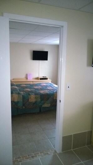 Apartamento família, 2 camas Queen, cozinha | Cortinas blackout, Wi-Fi de cortesia, roupa de cama