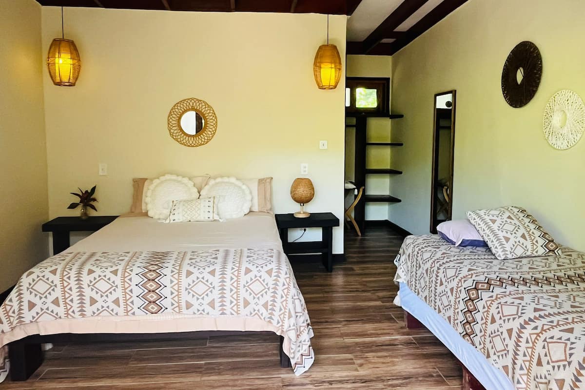 Economy Triple Room, Garden View, Courtyard Area | Free WiFi, bed sheets