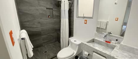 Rainfall showerhead, designer toiletries, towels, soap