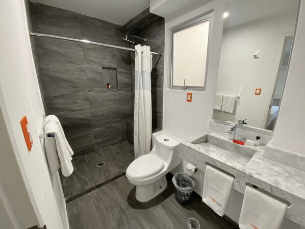 Rainfall showerhead, designer toiletries, towels, soap