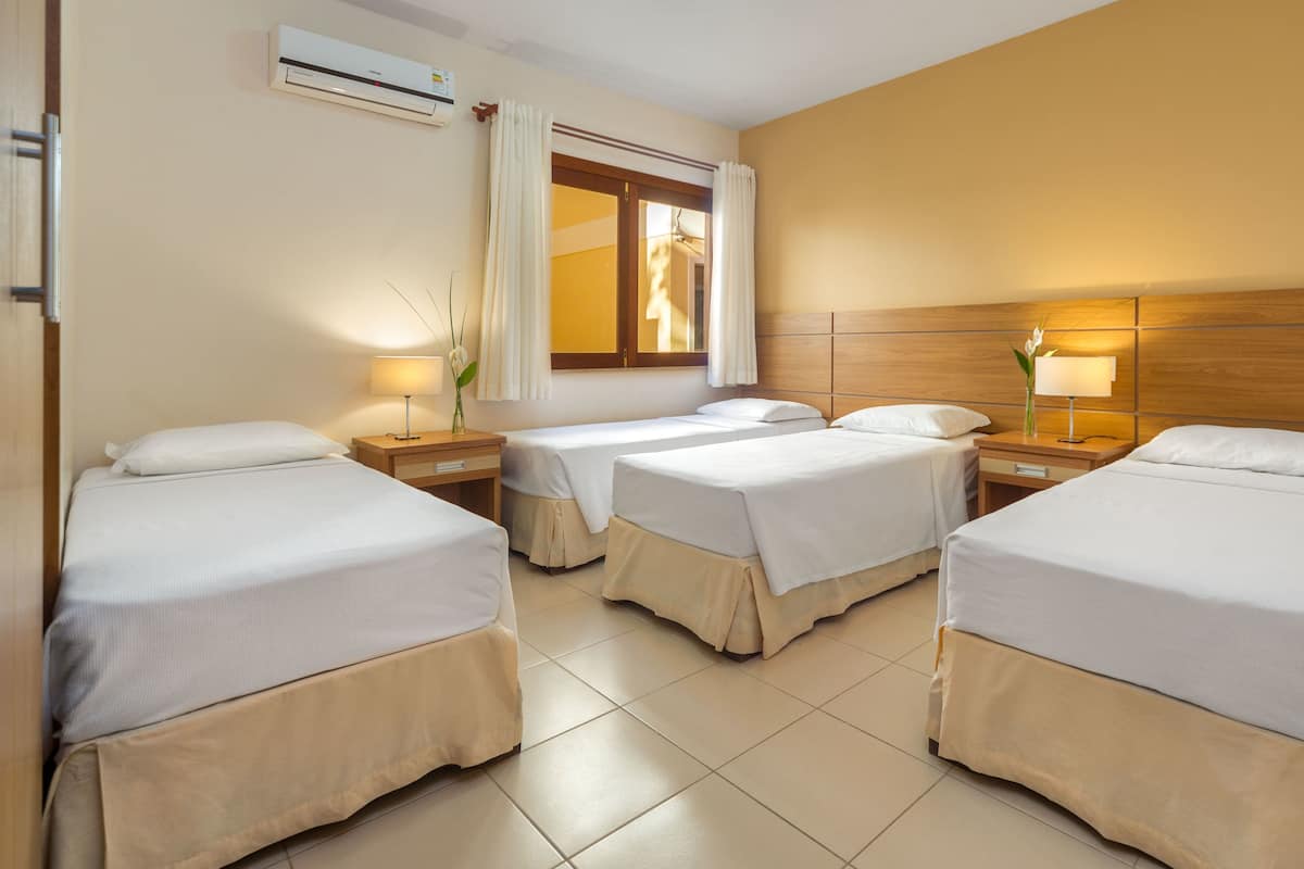 family suite, 2 bedrooms, garden view | minibar, in-room safe, blackout curtains, free wifi