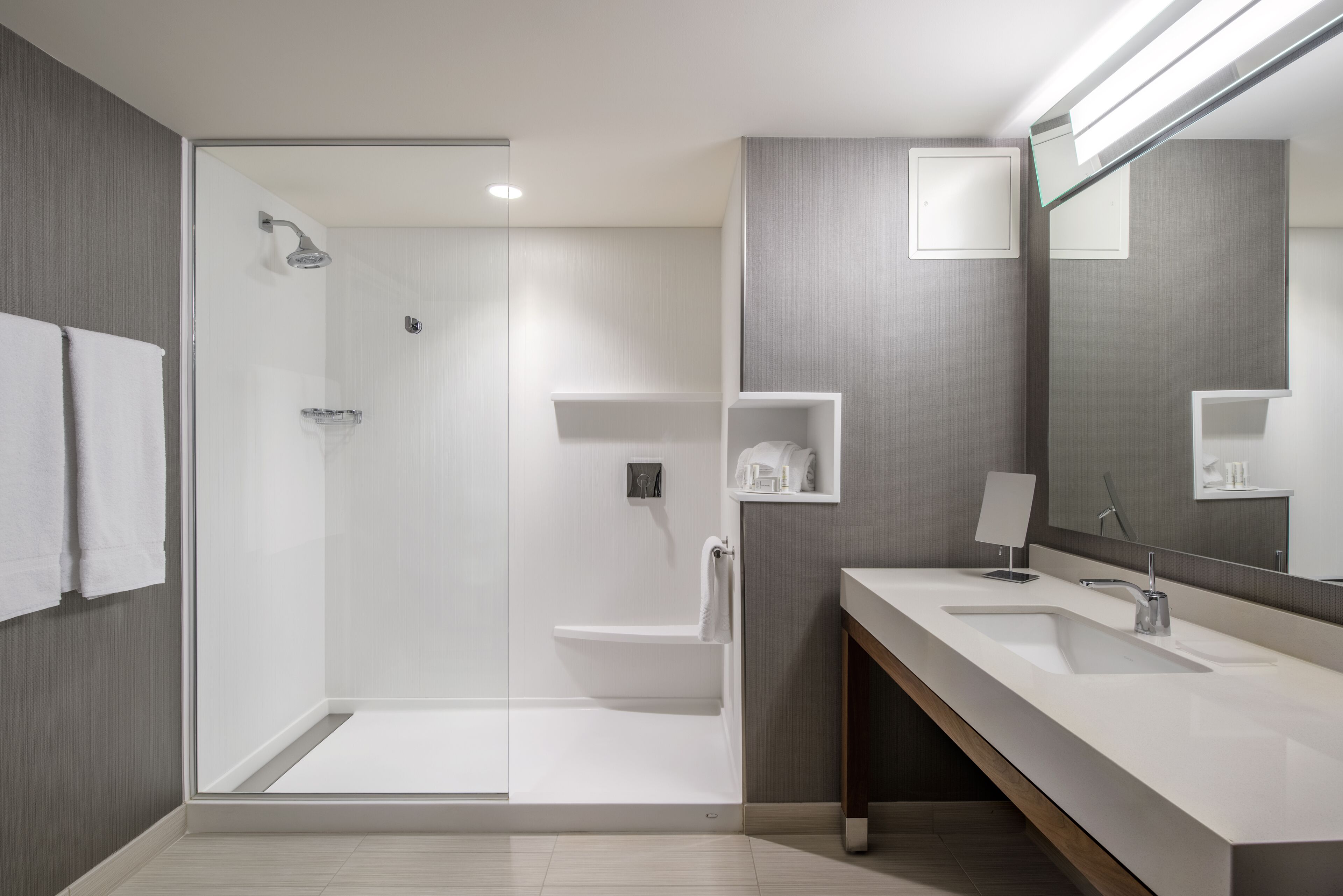 shower, eco-friendly toiletries, hair dryer, towels