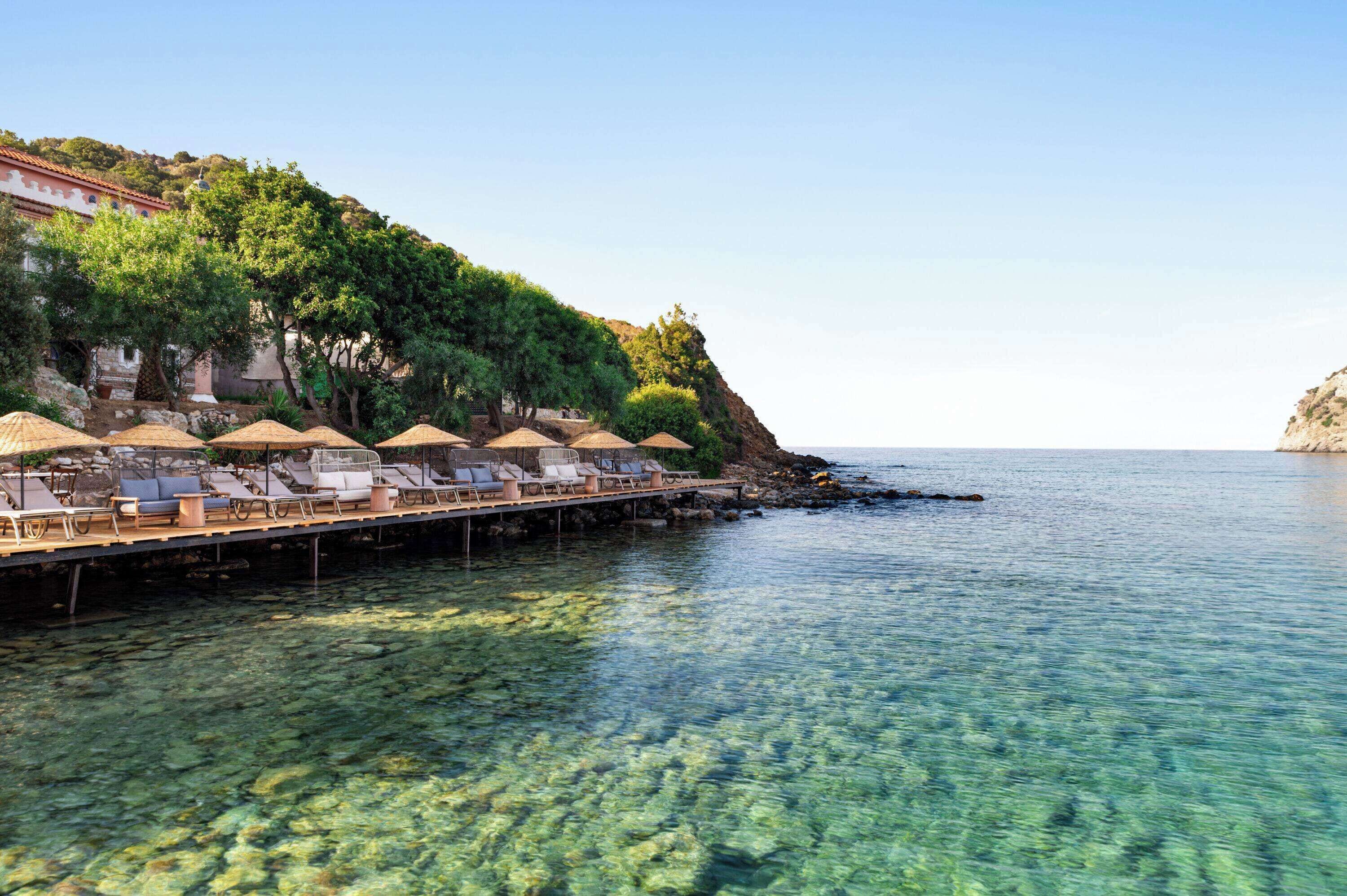On the beach, sun-loungers, beach umbrellas, beach towels