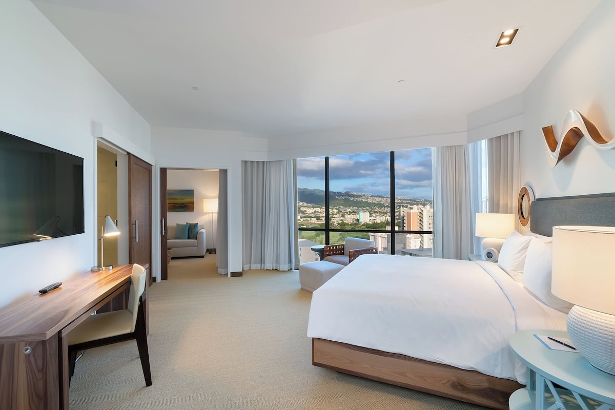 Suite, 1 King Bed with Sofa bed, City View | Premium bedding, in-room safe, blackout curtains, iron/ironing board