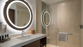 Designer toiletries, hair dryer, towels, soap