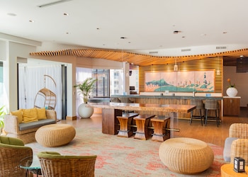 Sitting area in hotel lobby at Hyatt Centric Waikiki Beach
