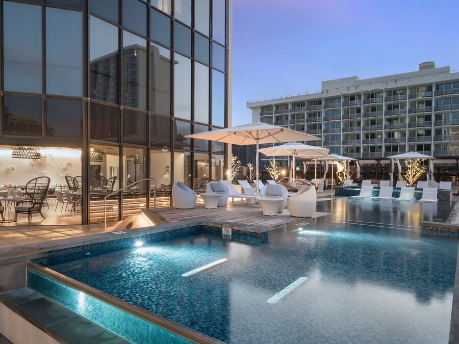 Outdoor pool, open 8:00 AM to 10:00 PM, free pool cabanas