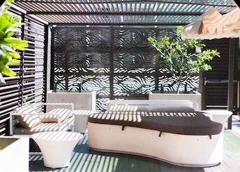 Outdoor pool, open 8:00 AM to 10:00 PM, free cabanas, pool umbrellas at Hyatt Centric Waikiki Beach
