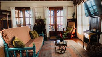 Phòng Deluxe, nhiều giường, bếp nhỏ, quang cảnh biển | Bộ đồ giường cao cấp, chăn bông, nệm có lớp đệm bông