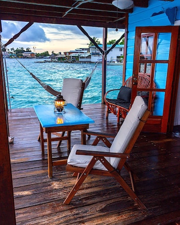 Deluxe Room, 1 Queen Bed, Kitchenette, Ocean View | Terrace/patio