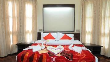 Minibar, desk, blackout drapes, iron/ironing board