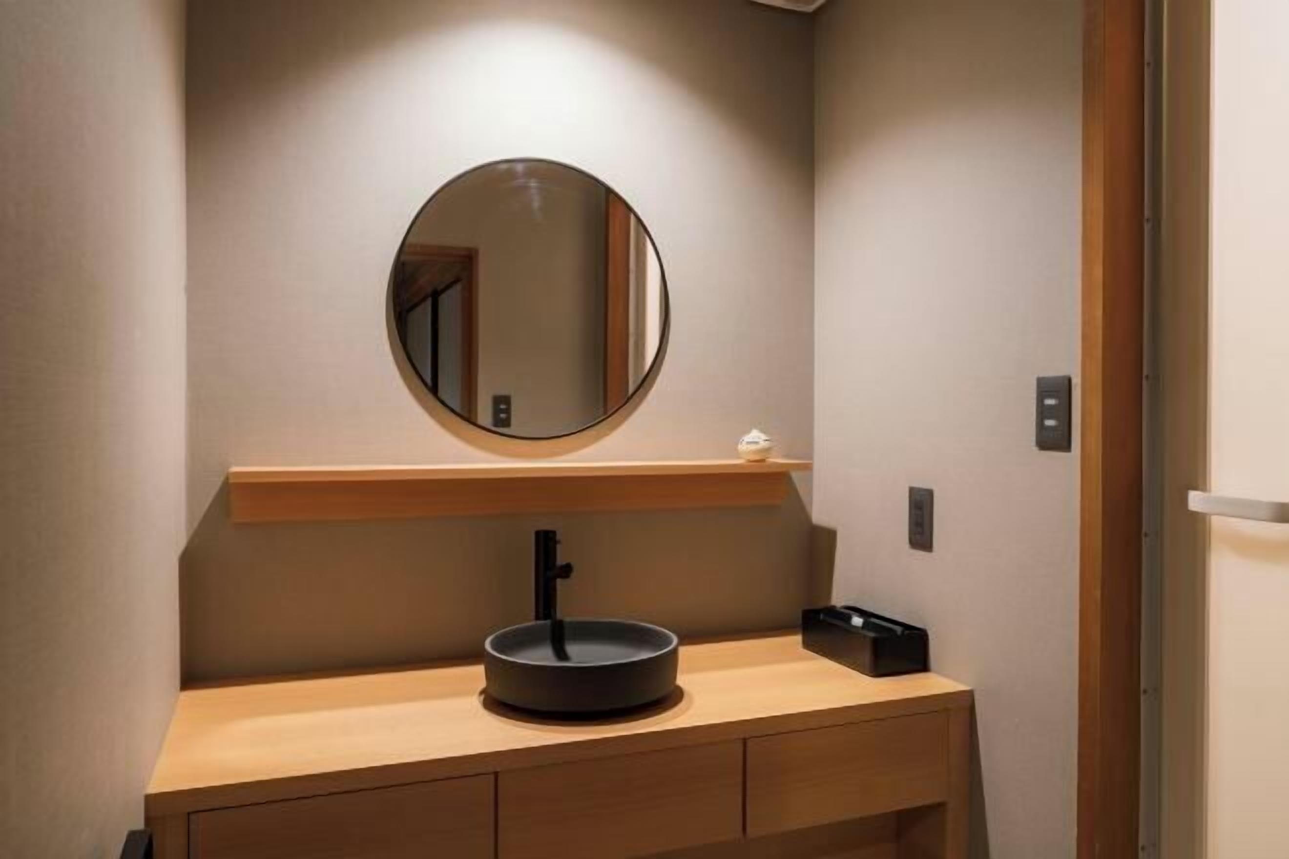 Free toiletries, hair dryer, slippers, electronic bidet