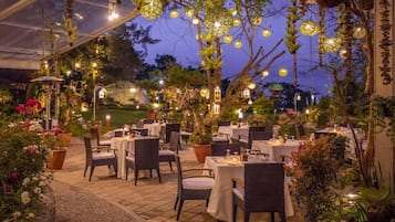 Breakfast, lunch, dinner served; international cuisine, garden views