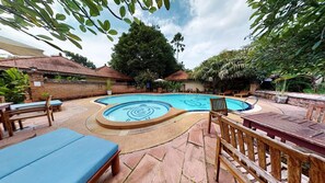 Outdoor pool, pool umbrellas, pool loungers