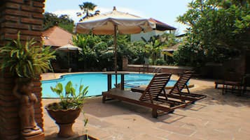 Outdoor pool, pool umbrellas, pool loungers