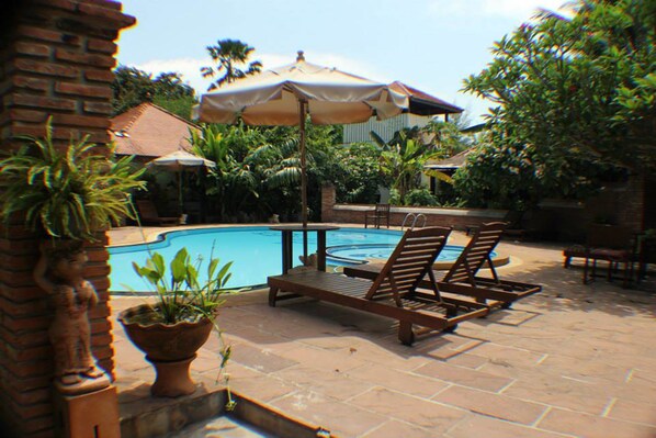 Outdoor pool, pool umbrellas, pool loungers