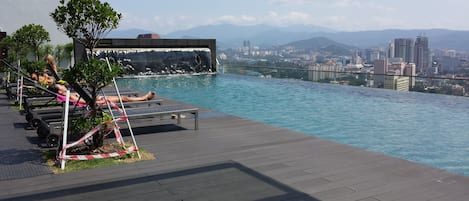 2 outdoor pools, sun loungers