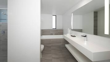Premium Suite, 1 King Bed, Balcony | Bathroom | Free toiletries, hair dryer, bathrobes, slippers