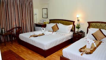 Family Room | Minibar, in-room safe, desk, WiFi (free)