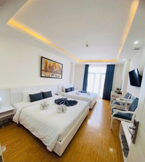 Family Studio Suite, 2 Queen Beds | Hypo-allergenic bedding, minibar, in-room safe, individually decorated - Hotel La Perle Hue (Hue)
