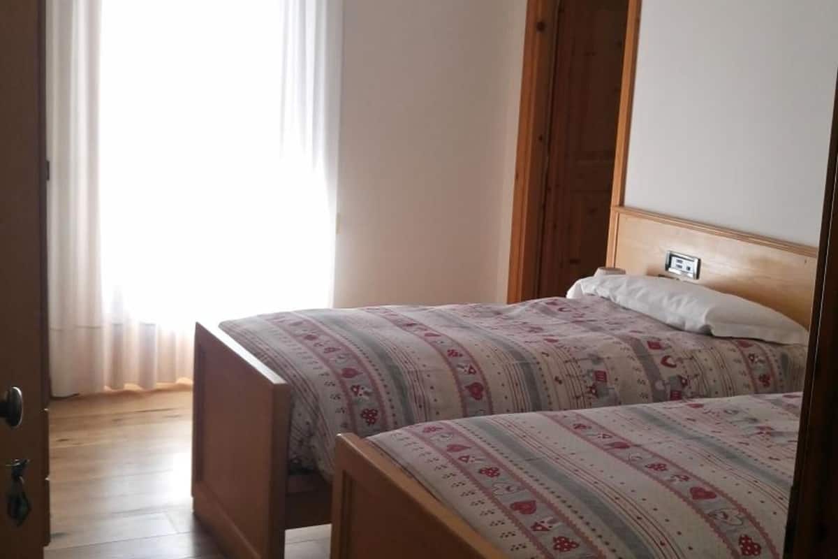 premium bedding, desk, laptop workspace, soundproofing