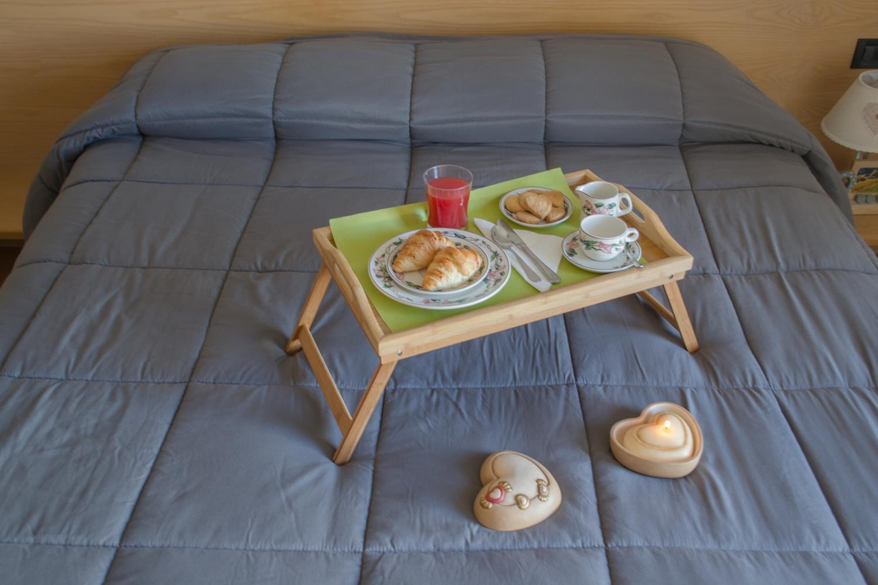 premium bedding, desk, laptop workspace, soundproofing