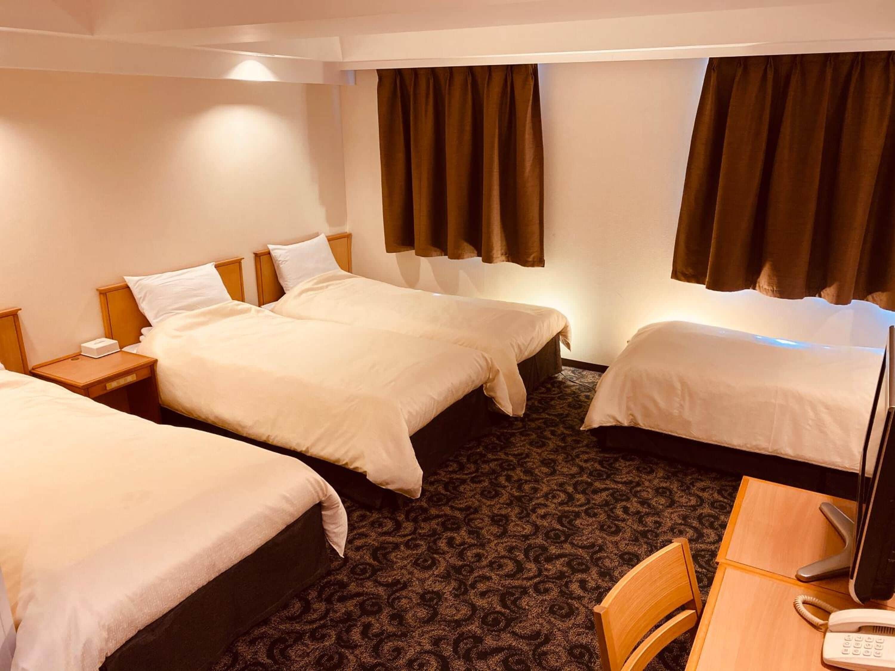 quadruple room, non smoking | 1 bedroom, desk, blackout curtains, free wired internet