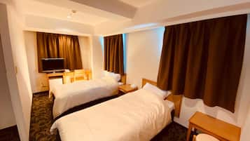 Twin Room, Non Smoking | Desk, blackout drapes, free wired internet, bed sheets